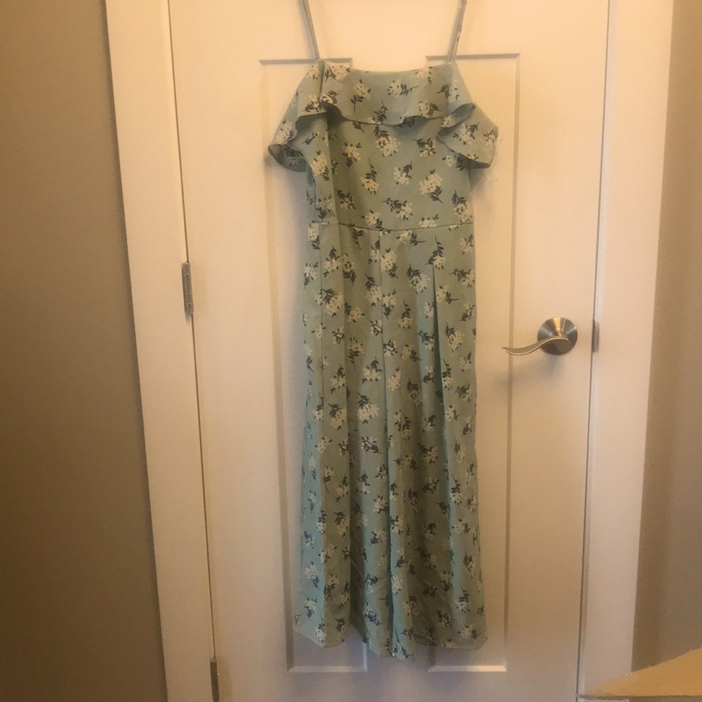 Brand new romper-never worn.  Trixxi brand.